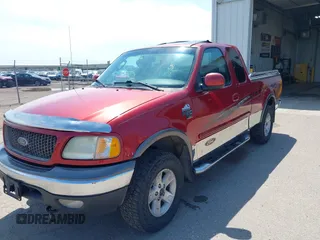 2002 Ford F-150 XL with VIN 1FTRX18L72NB09679, listed as a IAAI auction lot 42542526 with Not provided miles and . Bid and sale history available at DreamBid. Image 20.