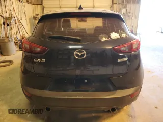 2016 Mazda CX-3 Touring with VIN JM1DKDC76G0136607, listed as a Copart auction lot 82928624 with Not Provided miles and Salvage Title. Bid and sale history available at DreamBid. Image 6.
