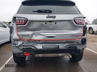 2019 Jeep Compass Trailhawk z VIN 3C4NJDDB9KT721767, wystawiony jako IAAI lot #42115252 z przebiegiem 78 607 mil mil oraz . Historia ofert i sprzedaży dostępna na DreamBid. Obrazek 6.