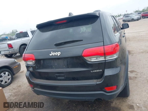 2015 Jeep Grand Cherokee Altitude with VIN 1C4RJEAG3FC944427, listed as a IAAI auction lot 41929483 with 128,114 mi miles. Bid and sale history available at carsss.com. Image 16.