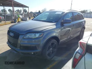2014 Audi Q7 3.0T S line Prestige with VIN WA1DGAFE2ED009086, listed as a IAAI auction lot 41824179 with 136,899 mi miles. Bid and sale history available at carsss.com. Image 2.