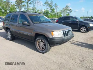 2001 Jeep Grand Cherokee Laredo z VIN 1J4GX48S91C559693, wystawiony jako IAAI lot #42152103 z przebiegiem 152 713 mil mil oraz . Historia ofert i sprzedaży dostępna na DreamBid. Obrazek 1.