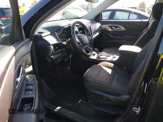 2019 Chevrolet Traverse LT Cloth z VIN 1GNEVGKW7KJ208656, wystawiony jako IAAI lot #42373422 z przebiegiem 132 863 mil mil oraz . Historia ofert i sprzedaży dostępna na DreamBid. Obrazek 5.