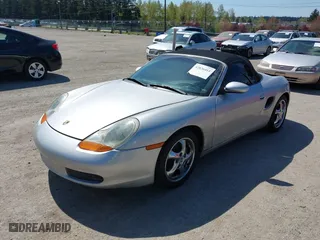 1998 Porsche Boxster with VIN WP0CA2983WU624195, listed as a IAAI auction lot 42036411 with 159,202 mi miles. Bid and sale history available at carsss.com. Image 2.
