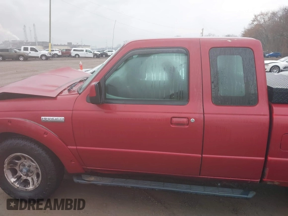 2009 Ford Ranger XLT with VIN 1FTYR44E79PA69116, listed as a IAAI auction lot 41045261 with 118,649 mi miles. Bid and sale history available at carsss.com. Image 14.