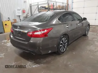 2016 Nissan Altima 2.5 S with VIN 1N4AL3AP4GC145811, listed as a IAAI auction lot 41424415 with 124,224 mi miles. Bid and sale history available at carsss.com. Image 4.