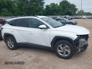 2023 Hyundai Tucson SEL with VIN 5NMJBCAE2PH275003, listed as a IAAI auction lot 42280613 with 62,295 mi miles and . Bid and sale history available at DreamBid. Image 14.