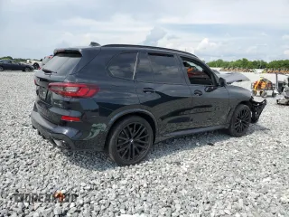 2023 BMW X5 xDrive40i with VIN 5UXCR6C07P9R18608, listed as a Copart auction lot 55911595 with Not provided miles and Salvage title. Bid and sale history available at DreamBid. Image 3.