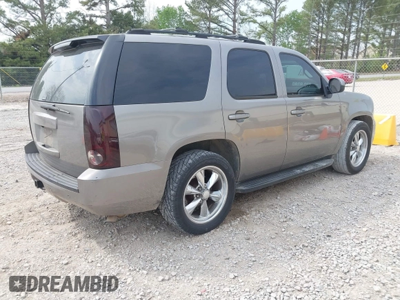 2007 GMC Yukon SLT with VIN 1GKFC13057R126741, listed as a IAAI auction lot 41910018 with 244,921 mi miles. Bid and sale history available at carsss.com. Image 4.