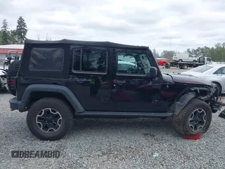 2015 Jeep Wrangler Unlimited Rubicon Hard Rock with VIN 1C4HJWFG6FL757421, listed as a IAAI auction lot 42107514 with 63,997 mi miles and . Bid and sale history available at DreamBid. Image 14.