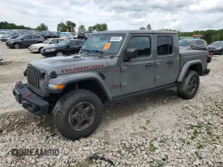 2021 Jeep Gladiator Rubicon z VIN 1C6JJTBGXML508114, wystawiony jako Copart lot #62556325 z przebiegiem 174 505 mil mil oraz Czysty tytuł • Clean title. Historia ofert i sprzedaży dostępna na DreamBid. Obrazek 1.