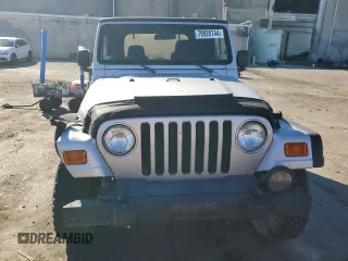 2003 Jeep Wrangler Rubicon z VIN 1J4FA69SX3P301962, wystawiony jako Copart lot #79928744 z przebiegiem Nie podano mil oraz Czysty tytuł • Clean title. Historia ofert i sprzedaży dostępna na DreamBid. Obrazek 5.