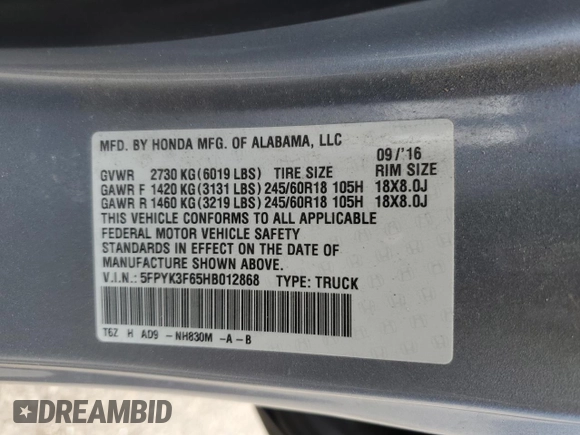 2017 Honda Ridgeline RTL-T with VIN 5FPYK3F65HB012868, listed as a Copart auction lot 57562885 with 115,530 mi miles and Salvage title. Bid and sale history available at DreamBid. Image 13.