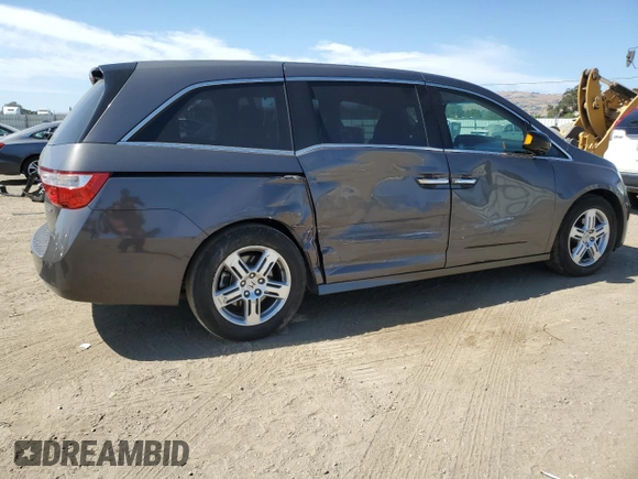 2012 Honda Odyssey Touring с VIN 5FNRL5H9XCB116455, выставлен на аукционе Copart как лот 60880835 с пробегом 96 672 миль миль и Списание • Salvage title. История ставок и продаж доступна на DreamBid. Изображение 3.