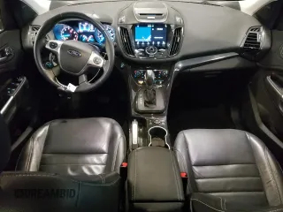 2016 Ford Escape Titanium with VIN 1FMCU9J97GUA67485, listed as a Copart auction lot 57623135 with 95,147 mi miles and Salvage title. Bid and sale history available at DreamBid. Image 8.