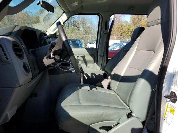 2011 Ford Econoline Passenger XL with VIN 1FBNE3BL3BDB11156, listed as a Copart auction lot 78824454 with 65,297 mi miles and Salvage Title. Bid and sale history available at carsss.com. Image 7.