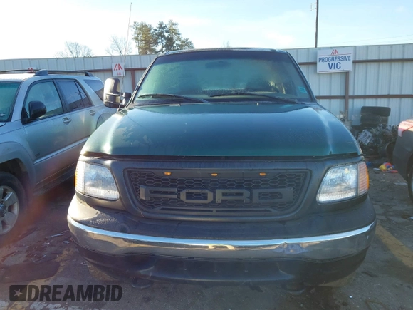 1999 Ford F-150 z VIN 1FTRX18W7XNA40655, wystawiony jako IAAI lot #41445754 z przebiegiem 362 296 mil mil oraz . Historia ofert i sprzedaży dostępna na DreamBid. Obrazek 12.