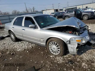 2010 Mercury Grand Marquis LS z VIN 2MEBM7FV4AX636897, wystawiony jako Copart lot #53387985 z przebiegiem Nie podano mil oraz Szkody całkowita. Historia ofert i sprzedaży dostępna na DreamBid. Obrazek 4.