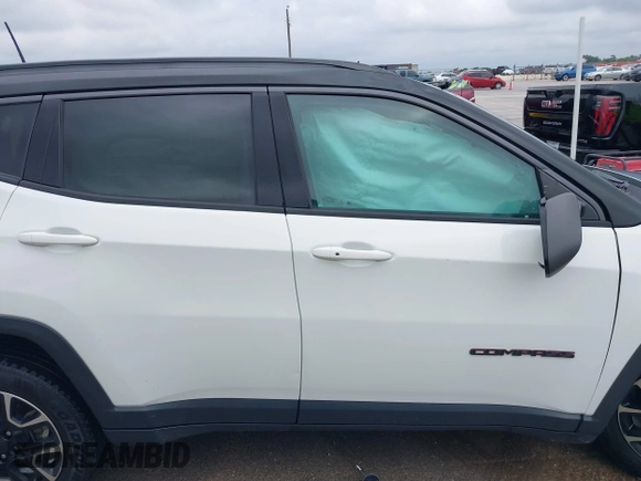 2020 Jeep Compass Trailhawk z VIN 3C4NJDDB6LT126585, wystawiony jako IAAI lot #42210794 z przebiegiem 132 220 mil mil oraz . Historia ofert i sprzedaży dostępna na DreamBid. Obrazek 13.