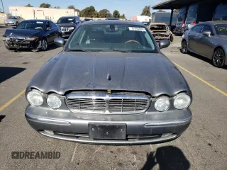 2005 Jaguar XJ with VIN SAJWA79C15SG40523, listed as a Copart auction lot 77994844 with 113,634 mi miles and Clean Title. Bid and sale history available at carsss.com. Image 5.