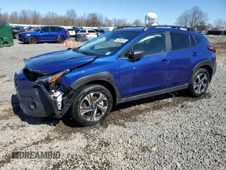 2024 Subaru Crosstrek Premium с VIN JF2GUADC4R8384491, выставлен на аукционе Copart как лот 49286025 с пробегом 2 579 миль миль и Списание • Salvage title. История ставок и продаж доступна на DreamBid. Изображение 1.
