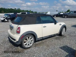 2010 MINI Convertible S with VIN WMWMS3C58ATY09098, listed as a IAAI auction lot 42149773 with 127,424 mi miles and . Bid and sale history available at DreamBid. Image 4.