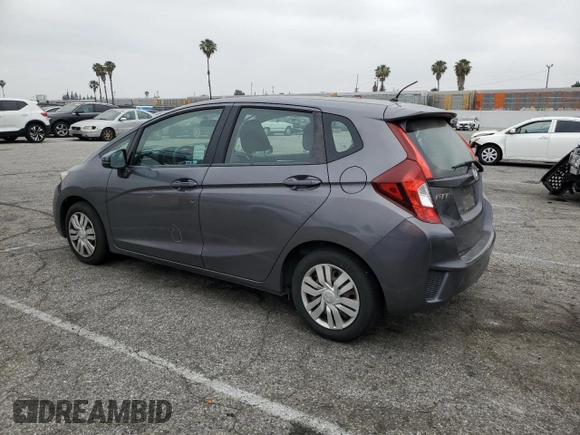 2015 Honda Fit LX z VIN 3HGGK5H58FM785137, wystawiony jako Copart lot #59013315 z przebiegiem 84 592 mil mil oraz Szkoda całkowita • Salvage title. Historia ofert i sprzedaży dostępna na DreamBid. Obrazek 2.
