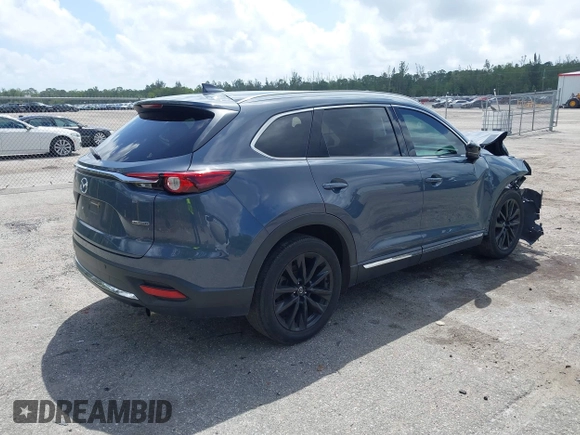 2021 Mazda CX-9 Carbon Edition with VIN JM3TCADY3M0517722, listed as a IAAI auction lot 41951164 with 43,868 mi miles and . Bid and sale history available at carsss.com. Image 4.