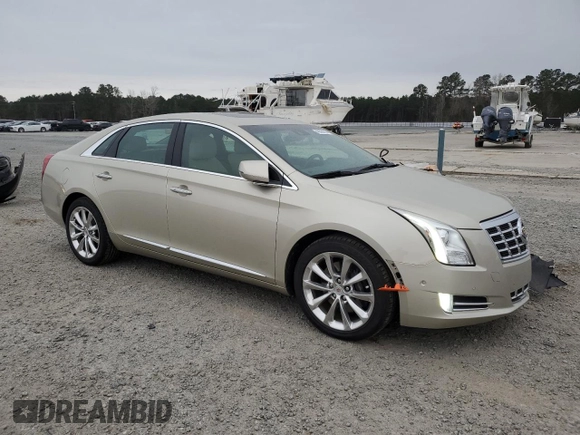 2014 Cadillac XTS Premium with VIN 2G61P5S32E9195930, listed as a Copart auction lot 48320165 with 31,026 mi miles and Salvage Title. Bid and sale history available at DreamBid. Image 4.