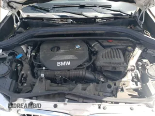 2018 BMW X1 xDrive28i with VIN WBXHT3C35J5L26952, listed as a Copart auction lot 51715035 with 63,306 mi miles and Salvage Title. Bid and sale history available at carsss.com. Image 12.