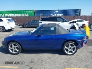 2003 Mazda MX-5 Miata Cloth z VIN JM1NB353830301964, wystawiony jako IAAI lot #42317534 z przebiegiem 192 342 mil mil oraz . Historia ofert i sprzedaży dostępna na DreamBid. Obrazek 14.