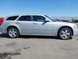 2005 Dodge Magnum z VIN 2D8GZ58235H576127, wystawiony jako IAAI lot #41989680 z przebiegiem 136 488 mil mil oraz . Historia ofert i sprzedaży dostępna na DreamBid. Obrazek 14.