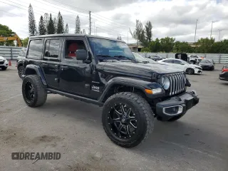 2019 Jeep Wrangler Unlimited Sahara with VIN 1C4HJXEN6KW595840, listed as a Copart auction lot 54382265 with 145,986 mi miles and Salvage Title. Bid and sale history available at carsss.com. Image 4.
