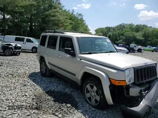 2007 Jeep Commander Sport z VIN 1J8HG48K67C651209, wystawiony jako Copart lot #64049035 z przebiegiem 216 628 mil mil oraz Szkoda całkowita • Salvage title. Historia ofert i sprzedaży dostępna na DreamBid. Obrazek 14.