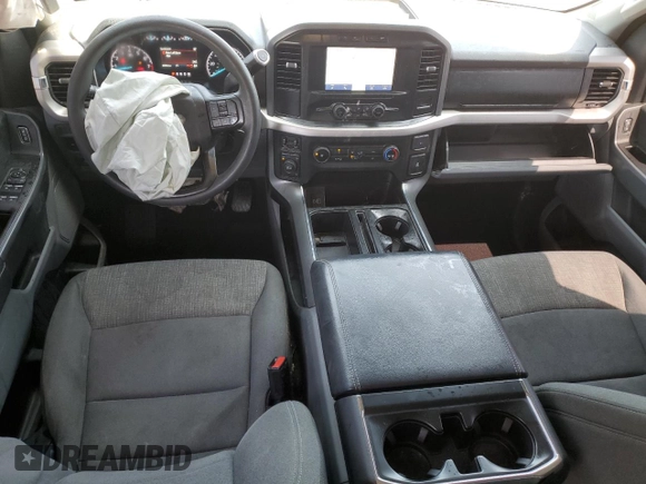 2021 Ford F-150 XL with VIN 1FTFW1E50MFA32128, listed as a Copart auction lot 56423385 with 88,965 mi miles and Salvage title. Bid and sale history available at DreamBid. Image 8.