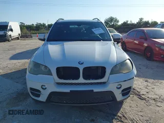 2011 BMW X5 35i with VIN 5UXZV4C52BL410497, listed as a IAAI auction lot 41995459 with 162,781 mi miles. Bid and sale history available at carsss.com. Image 12.