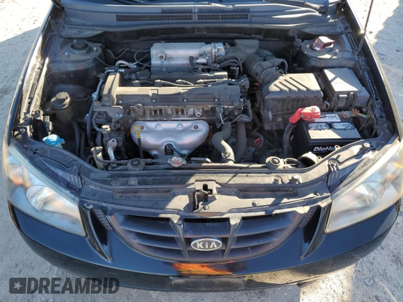 2005 Kia Spectra with VIN KNAFE161355073968, listed as a Copart auction lot 84543784 with 166,858 mi miles and Salvage Title. Bid and sale history available at carsss.com. Image 12.