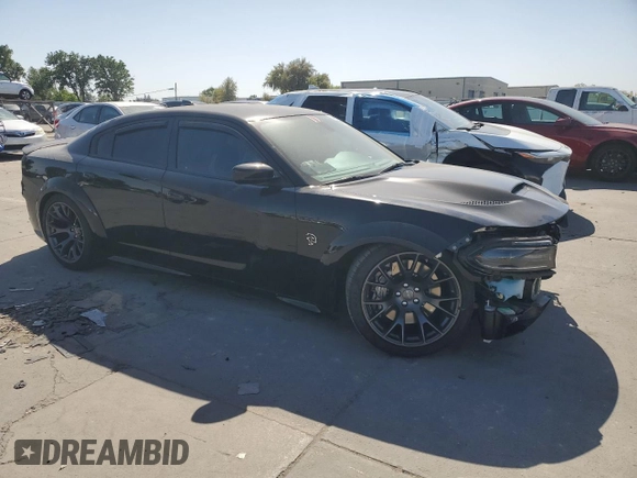2020 Dodge Charger SRT Hellcat z VIN 2C3CDXL90LH243946, wystawiony jako Copart lot #53099975 z przebiegiem 9 297 mil mil oraz Szkoda całkowita • Salvage title. Historia ofert i sprzedaży dostępna na DreamBid. Obrazek 4.