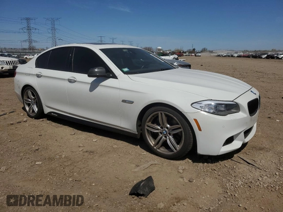 2013 BMW 5 Series 550i xDrive with VIN WBAFU9C52DDY71651, listed as a Copart auction lot 52156465 with 144,211 mi miles and Salvage title. Bid and sale history available at DreamBid. Image 4.