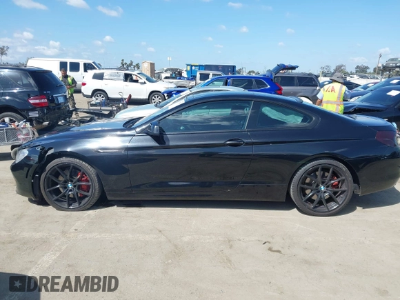 2013 BMW 6 Series 650i with VIN WBAYM9C57DDW20178, listed as a IAAI auction lot 41933561 with 72,886 mi miles and . Bid and sale history available at carsss.com. Image 15.