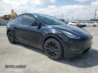 2020 Tesla Model Y Long Range with VIN 5YJYGDEE6LF051549, listed as a Copart auction lot 55063805 with 77,861 mi miles and Salvage Title. Bid and sale history available at DreamBid. Image 4.