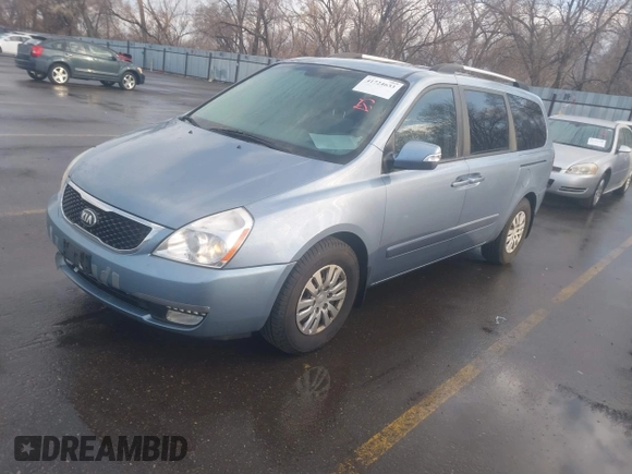 2014 Kia Sedona LX with VIN KNDMG4C79E6547589, listed as a IAAI auction lot 41724633 with 211,213 mi miles. Bid and sale history available at carsss.com. Image 2.