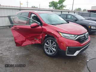 2021 Honda CR-V Touring with VIN 2HKRW2H9XMH663315, listed as a IAAI auction lot 42188893 with 26,203 mi miles and . Bid and sale history available at DreamBid. Image 1.