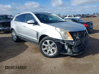 2014 Cadillac SRX Performance Collection with VIN 3GYFNCE39ES544135, listed as a IAAI auction lot 41808644 with 145,772 mi miles. Bid and sale history available at carsss.com. Image 1.