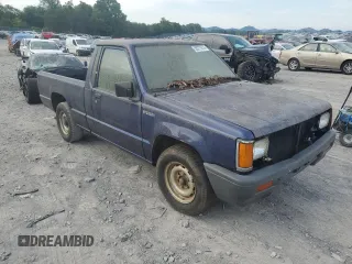 1995 Mitsubishi Mighty Max z VIN JA7LS21G4SP002839, wystawiony jako Copart lot #55777674 z przebiegiem Nie podano mil oraz Tytuł czysty. Historia ofert i sprzedaży dostępna na DreamBid. Obrazek 4.