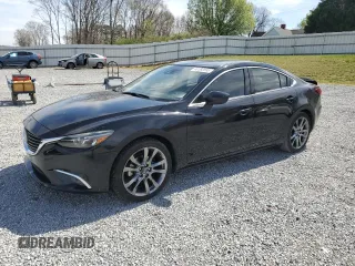 2016 Mazda Mazda6 i Grand Touring with VIN JM1GJ1W53G1435233, listed as a Copart auction lot 49693595 with 142,044 mi miles and Salvage Title. Bid and sale history available at carsss.com. Image 1.