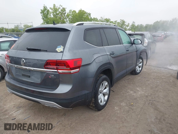 2018 Volkswagen Atlas SE z VIN 1V2KR2CAXJC517240, wystawiony jako IAAI lot #42361370 z przebiegiem 129 546 mil mil oraz . Historia ofert i sprzedaży dostępna na DreamBid. Obrazek 4.