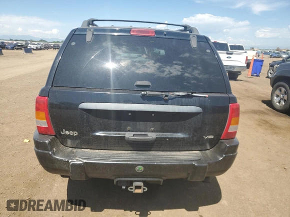 2000 Jeep Grand Cherokee Laredo z VIN 1J4GW48N0YC210235, wystawiony jako Copart lot #60558905 z przebiegiem 131 108 mil mil oraz Szkoda całkowita • Salvage title. Historia ofert i sprzedaży dostępna na DreamBid. Obrazek 6.