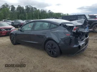2024 Tesla Model 3 Long Range with VIN 5YJ3E1EB2RF825213, listed as a Copart auction lot 51909875 with 9,717 mi miles and Salvage Title. Bid and sale history available at DreamBid. Image 2.