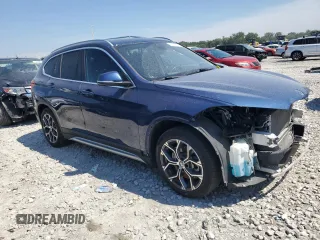 2021 BMW X1 xDrive28i with VIN WBXJG9C01M5T94314, listed as a Copart auction lot 60244134 with 43,933 mi miles and Salvage title. Bid and sale history available at DreamBid. Image 4.